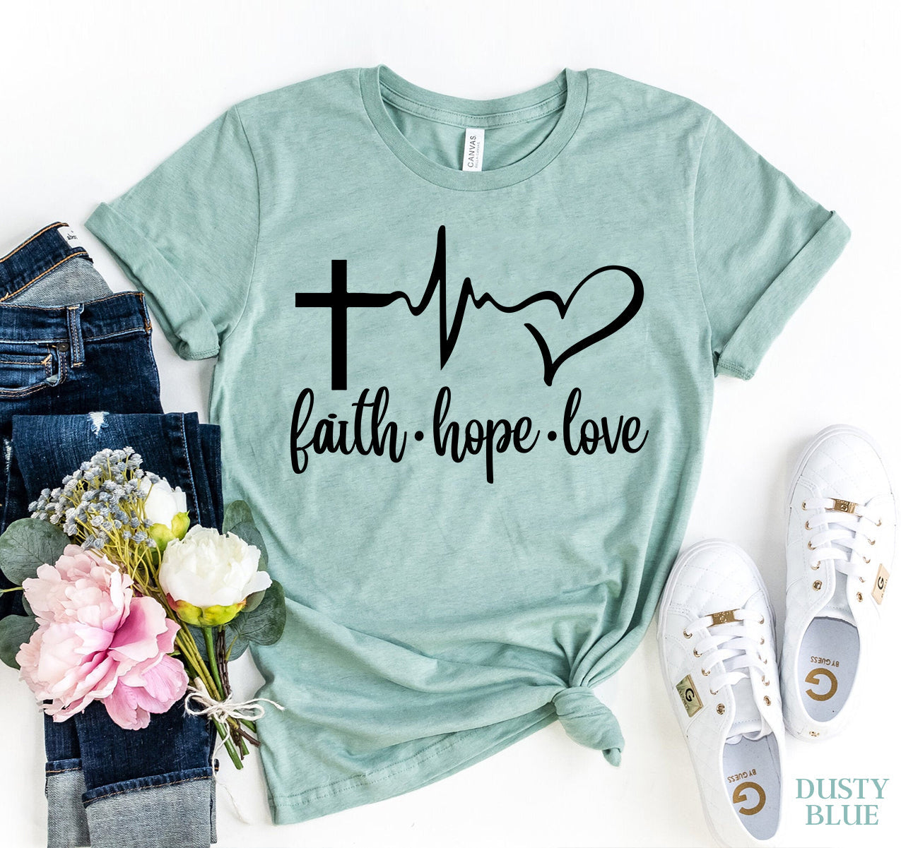 "Women's T-shirt with the words 'Faith, Hope, Love' printed in a stylish, bold font. 